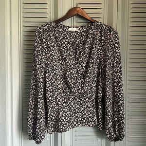 Lush Black and Ivory Peplum Blouse w/ Faux Wrap.